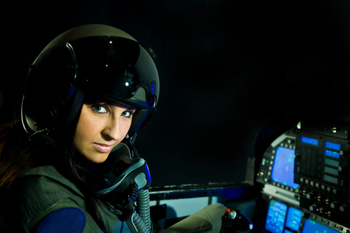 Military fighter plane pilot with helmet and oxygen mask.