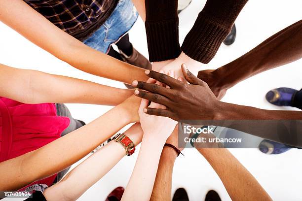 Teamwork Stock Photo - Download Image Now - Hands Clasped, Circle, Multiracial Group