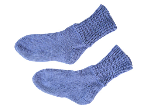 a pair of black socks with a transparent background