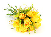 Yellow rose bouquet isolated on white with ribbon