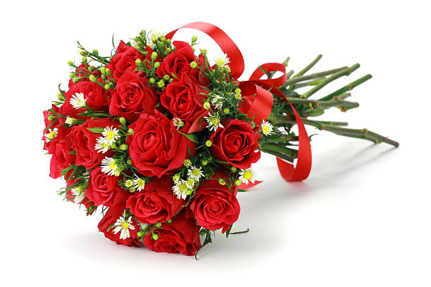 Red rose bouquet with white flowers and ribbon. stock photo