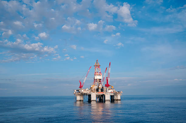 istock Ocean oil drilling platform and sky 157405573