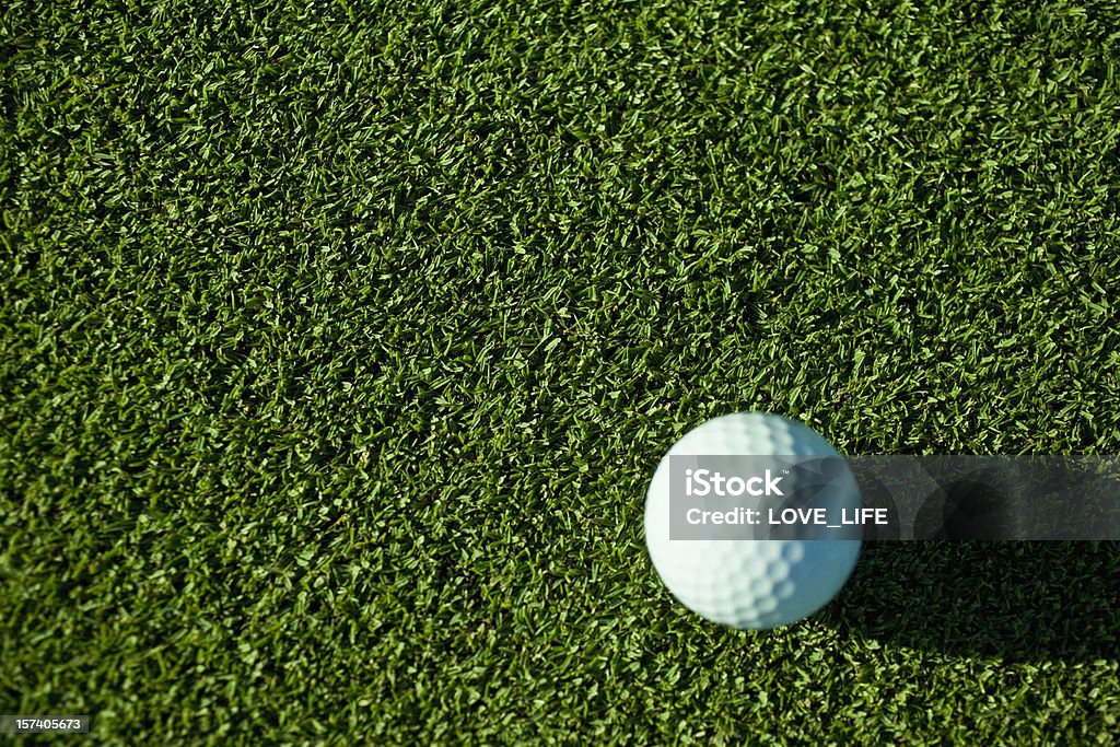 Golf Ball Golf Ball on putting green. Aerial View Stock Photo