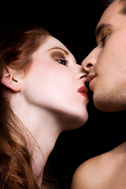 istock Kissing Couple 157405963