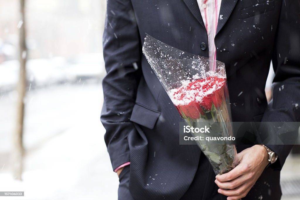Bouquet of Roses from Handsome Young Man for Valentines, Copyspace  Snow Stock Photo