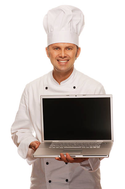 istock Male chef holding an open laptop 157406083