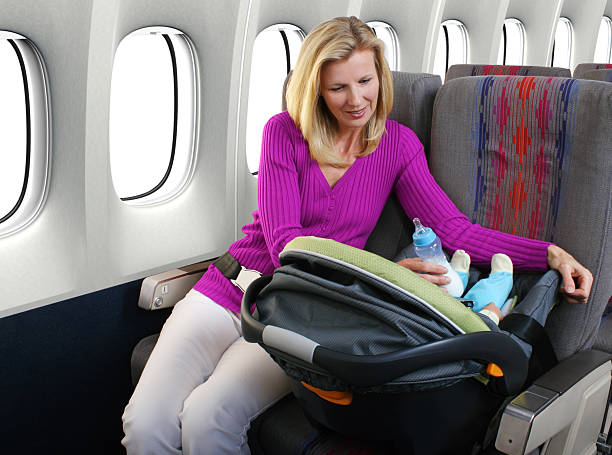 Mother And Infant Passengers  gchutka stock pictures, royalty-free photos & images