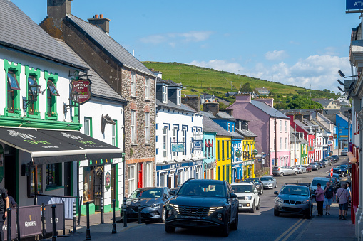 Dingle, Ireland - June 5, 2022: Colorful shops on a street in Dingle, Ireland.