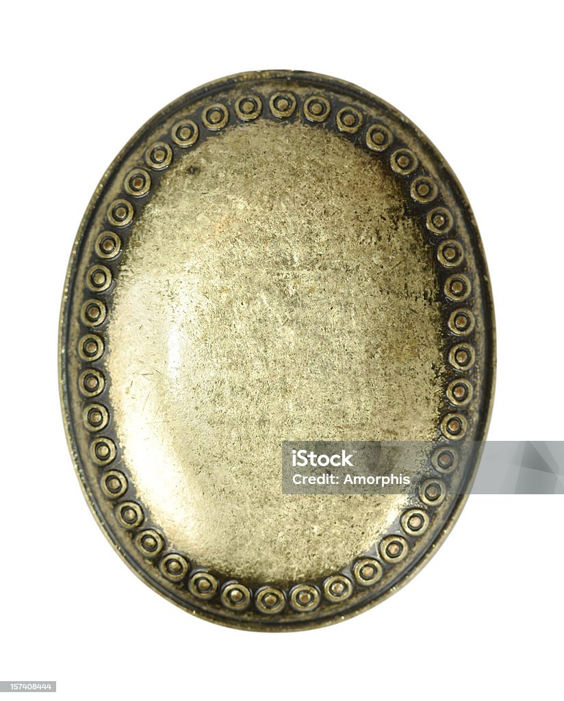 Locket Closed brass medallion isolated with clipping path on white background Medallion Stock Photo