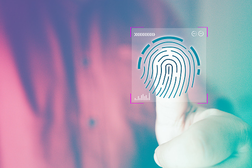 Fingerprint scan provides security access with biometrics identification, person touching screen with finger