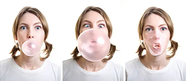 A sequence of photos showing a young woman who blows a large bubble only to have it pop in a messy explosion all over her face.  Isolated on a white background.