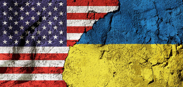 Flags of America and Ukraine overlapping on a distressed concrete wall
