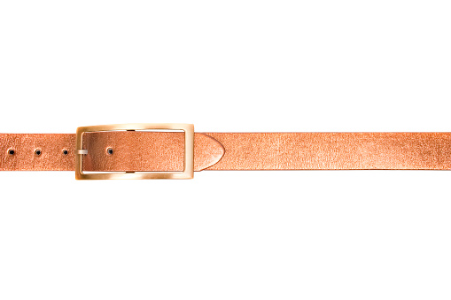 Yellow leather belt details with a clasp isolated on white background closeup