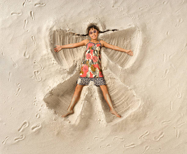 Sand Angel  snow angels stock pictures, royalty-free photos & images