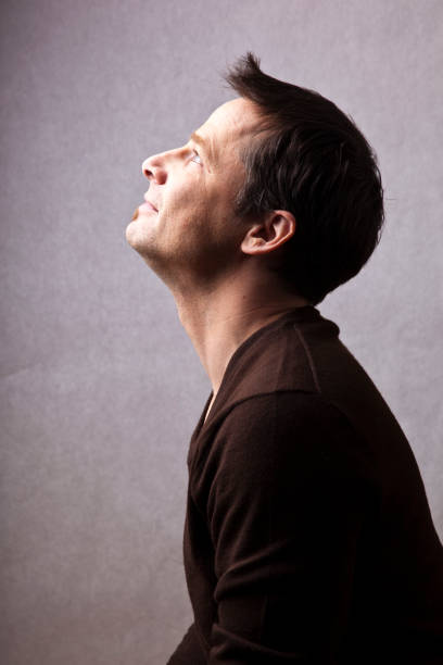 istock Profile portrait of middle aged man looking up 157419735