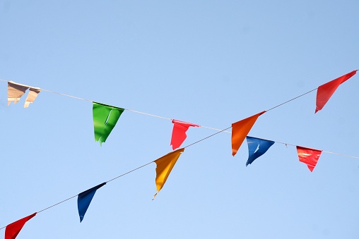 A variety color flags on top