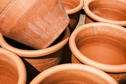 A collection of terracotta bowls arranged together