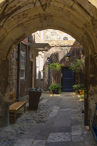 Narrow alley to houses in Westminster, London, England.