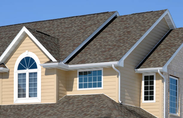 New Residential House; Architectural Asphalt Shingle Roof, Vinyl Siding, Gables stock photo