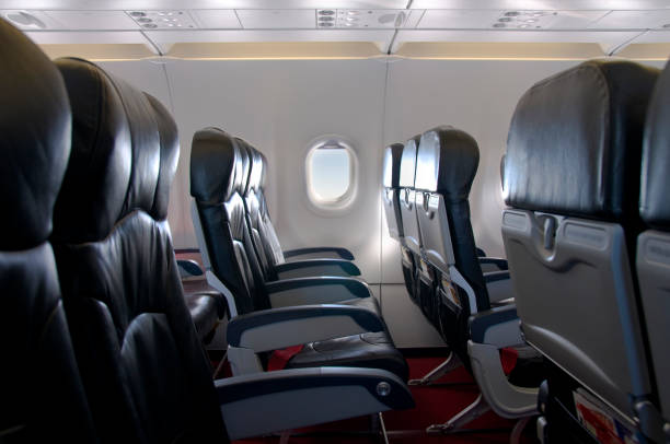 istock Premium Economy Class Seating Inside An Airplane Cabin 157420425