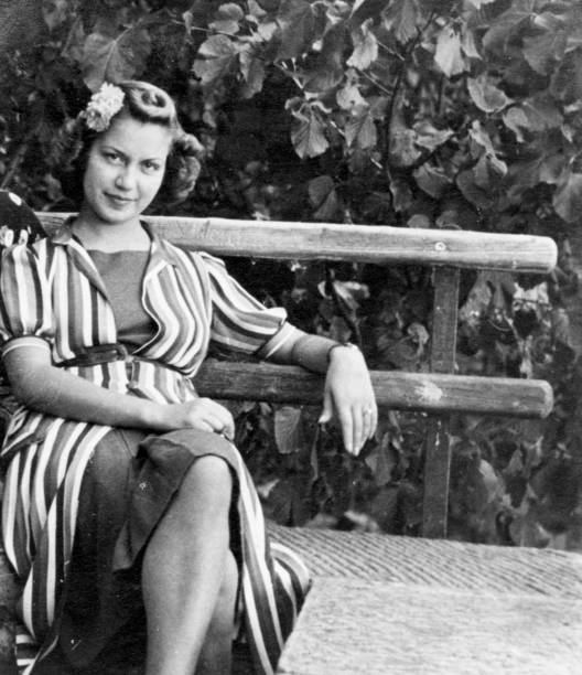 Young Woman on a Bench in 1931 Black And White  1940 stock pictures, royalty-free photos & images