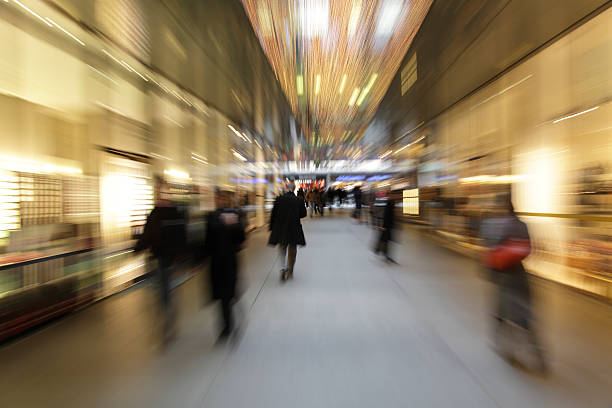 istock abstract people at chritmas shopping - motion blurred with zoom 157420535