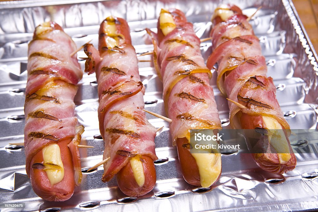 Grilled frankfurter Grilled frankfurter with cheese and bacon  Sausage Stock Photo
