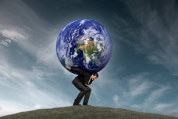 istock Businessman with the World on his Shoulders 157420699