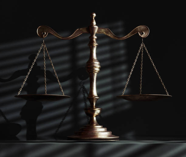 Scales Of Justice And Shadows