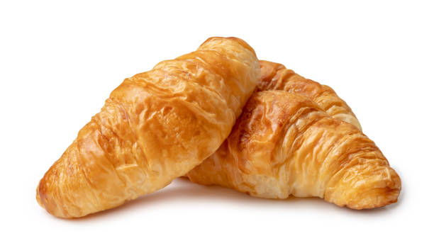 istock Three piece of croissant in stack isolated on white background with clipping path. 1574213475