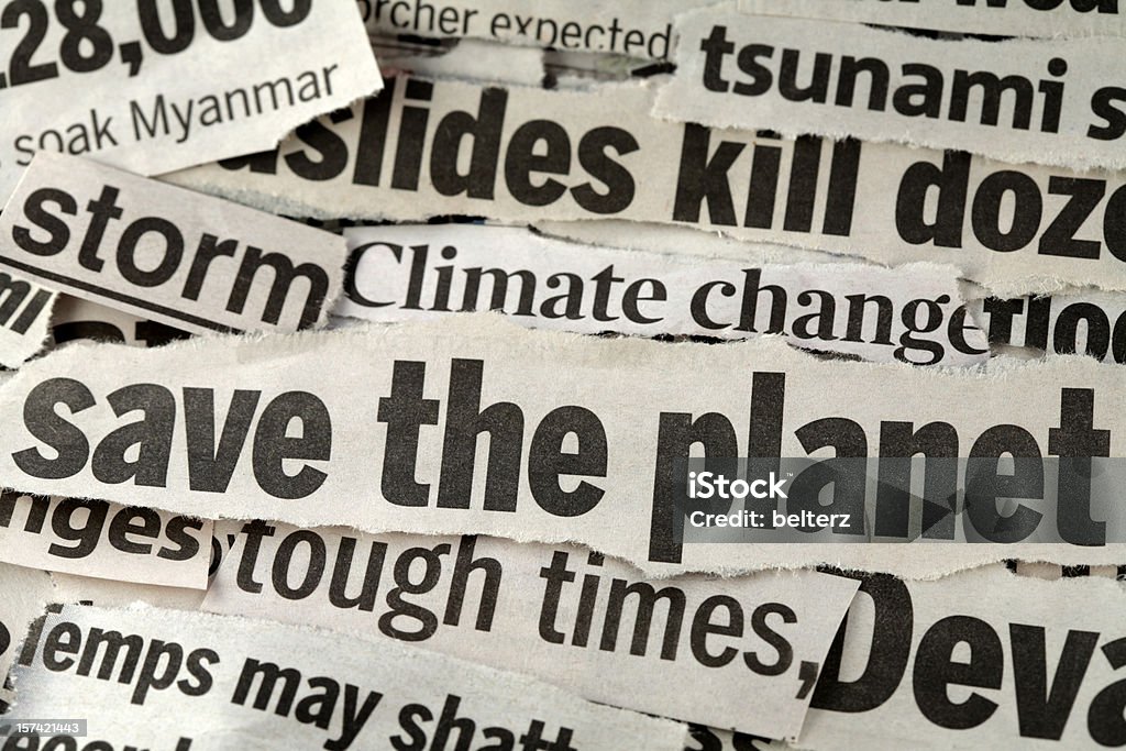 Save the planet newspaper strips newspaper cuttings with focus on the headline 'save the planet' Newspaper Stock Photo