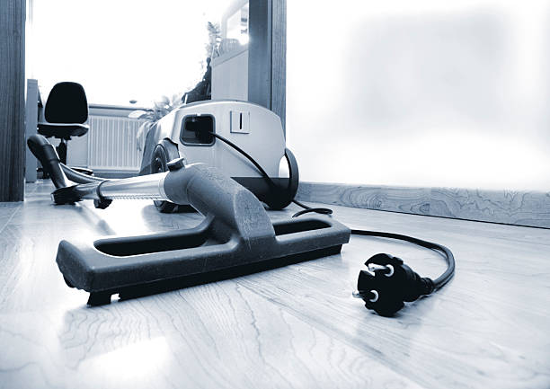 Vacuum cleaner in an old dusty house