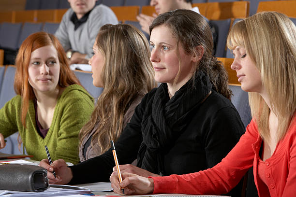 istock Students listening to lecture 157421508