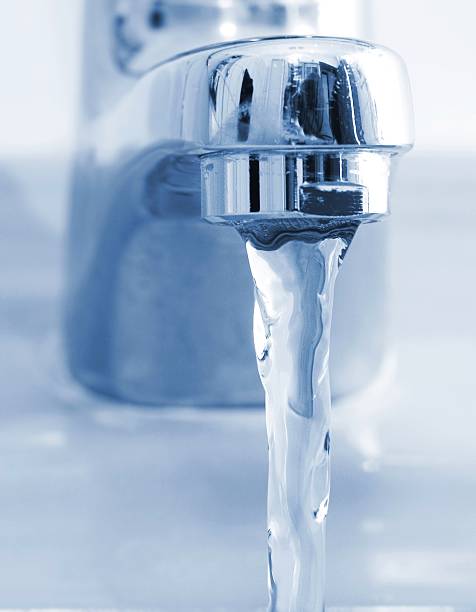 istock Running water from bathroom faucet 157421666