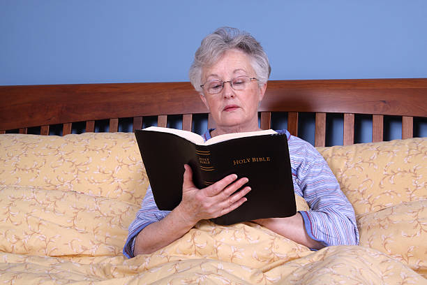 istock Reading the Bible in Bed 157421705