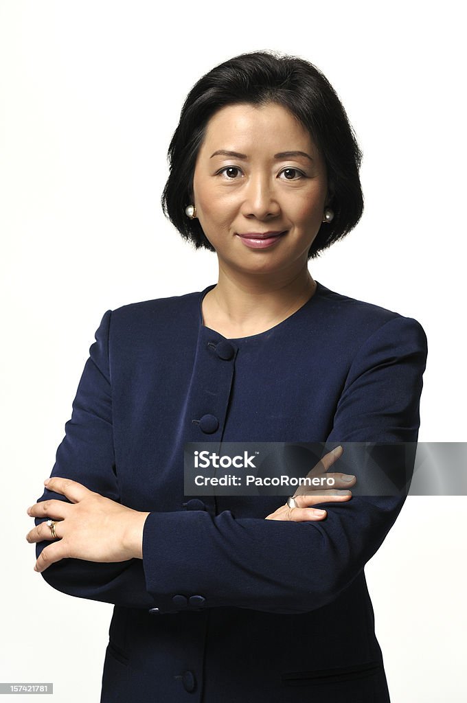De edad madura Asian businesswoman - Foto de stock de Ejecutiva libre de derechos