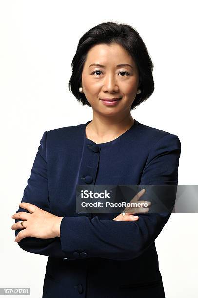 De Edad Madura Asian Businesswoman Foto de stock y más banco de imágenes de Ejecutiva - Ejecutiva, Fondo blanco, Mujeres
