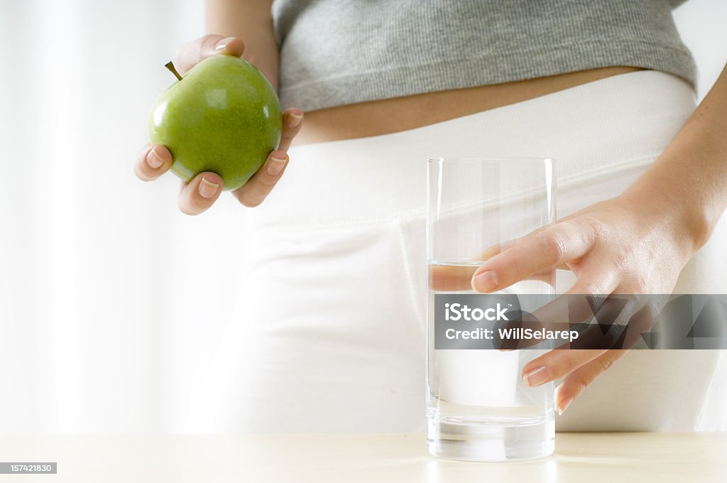 Healthy Diet Healthy Diet, woman holding an apple Adult Stock Photo