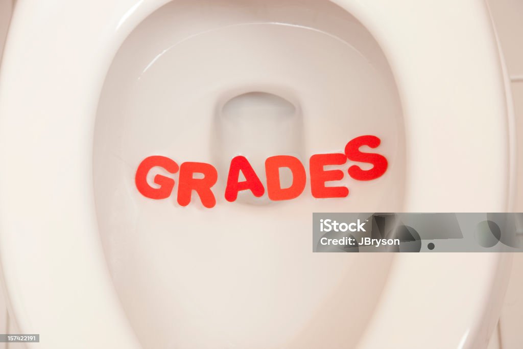 Failing Student Leaves Grades in the Toilet  Bathroom Stock Photo