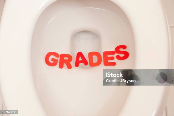 Failing Student Leaves Grades In The Toilet Stock Photo - Download Image Now - Bathroom, Close-up, Color Image