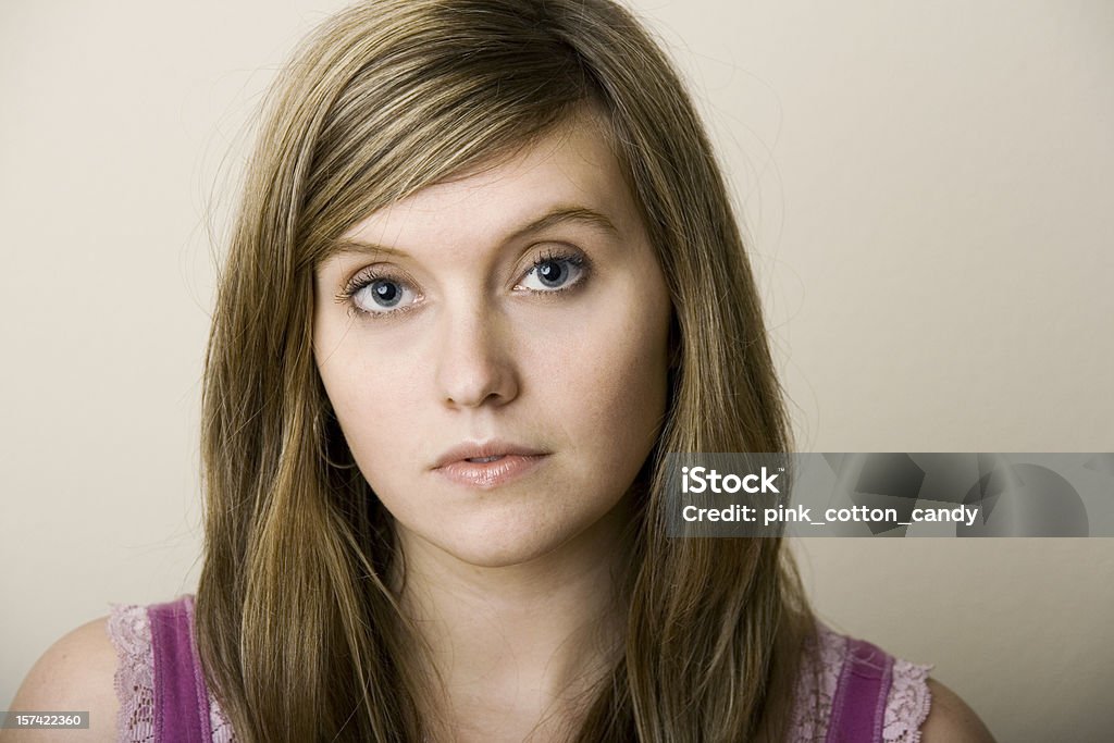 Young Woman with Compassion Young woman with a sincere gaze. 20-29 Years Stock Photo