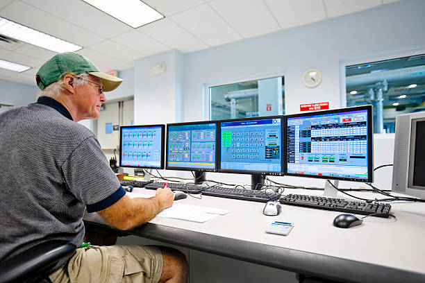 istock Technician Monitoring in Control Room 157422484
