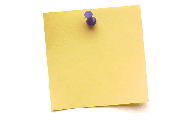 post-it giallo con perno di spinta - straight pin paper isolated single object foto e immagini stock