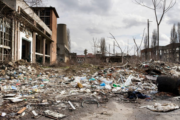 Garbage inside a destroyed factory courtyard on crisis time