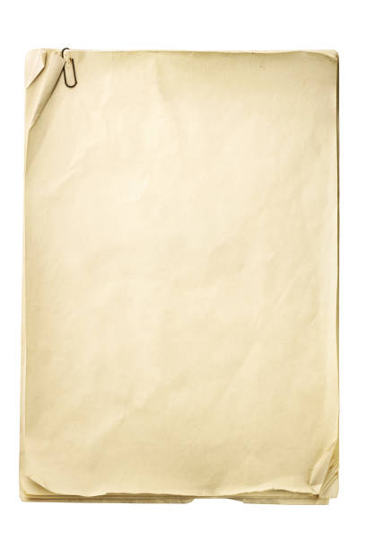 Stack of old papers with paper clip isolated on white