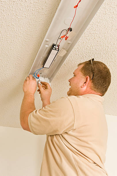 istock Installing Ballast In Electric Lighting Fixture 157423385
