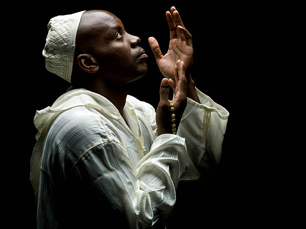 Sudanese Muslim Man Praying  bedouin photos stock pictures, royalty-free photos & images