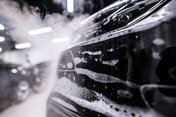 istock Car during the application of a colorless protective film 1574239155