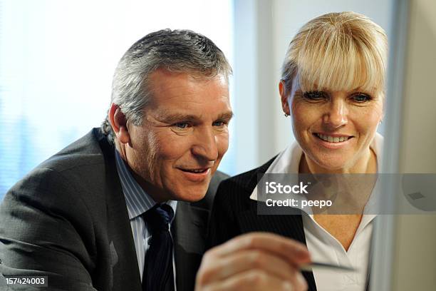 Interacting Business People Stock Photo - Download Image Now - 30-39 Years, Adult, Adults Only