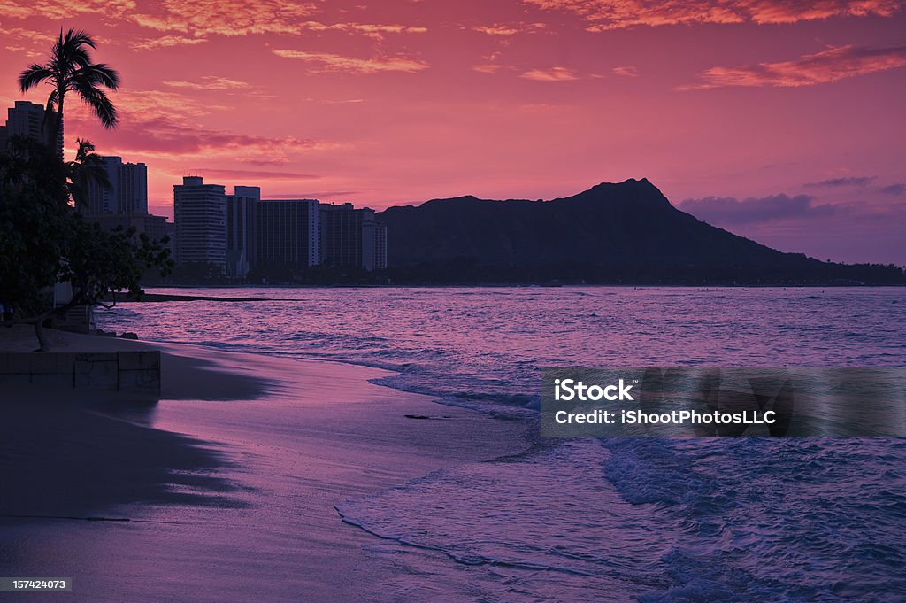 Dawn at Waikiki Beach Dawn at Waikiki Beach in Hawaii with Diamond Head in the Background ... Beach Stock Photo